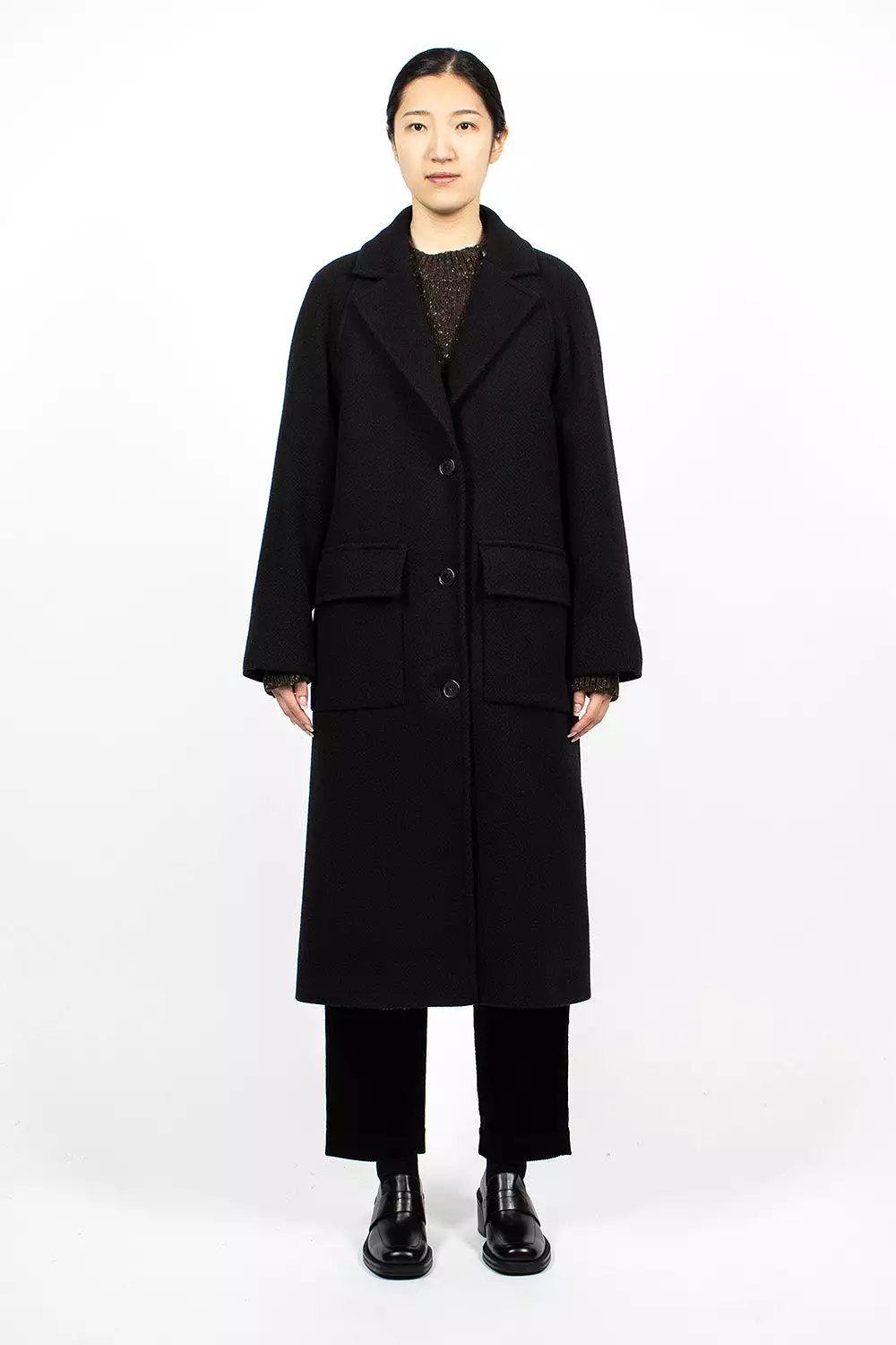 Black Raglan Overcoat.