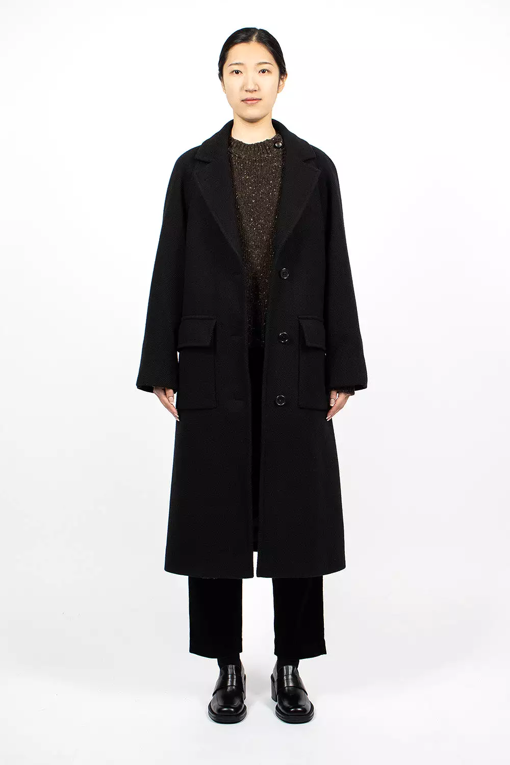 Black Raglan Overcoat.