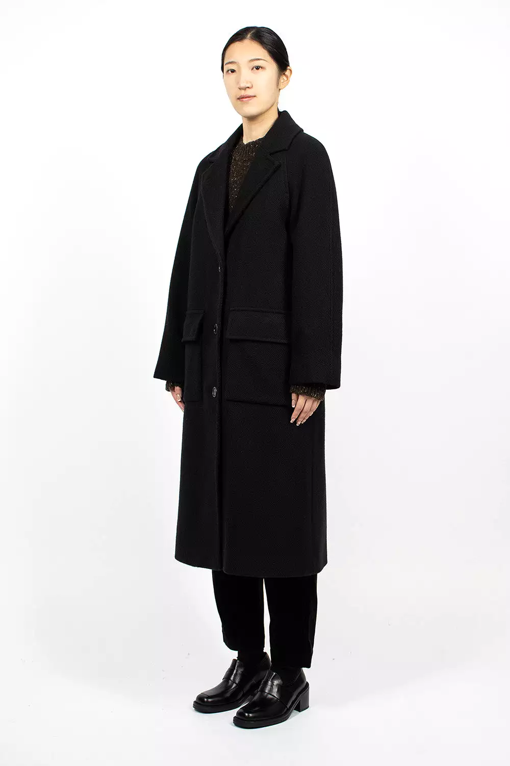 Black Raglan Overcoat.