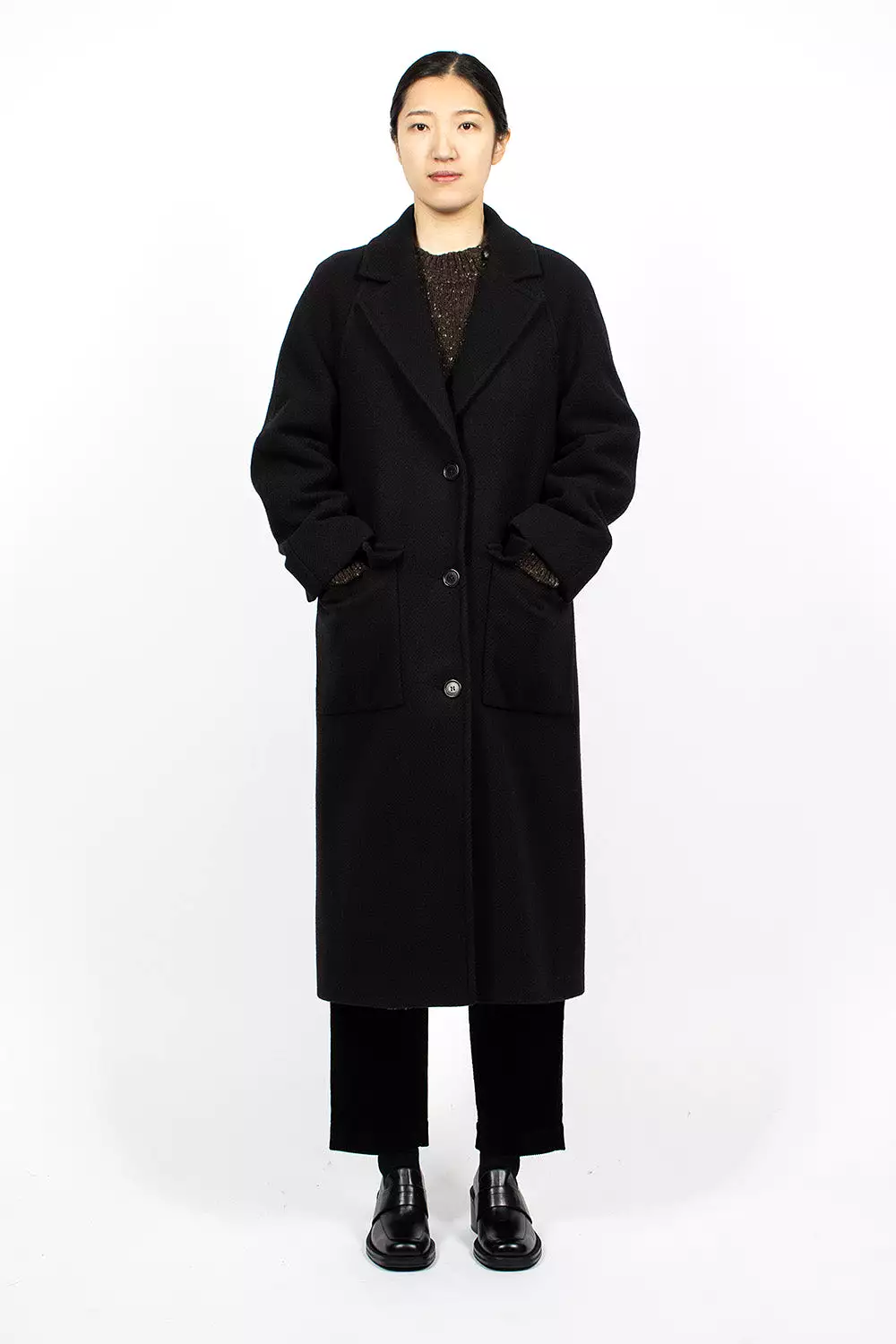 Black Raglan Overcoat.