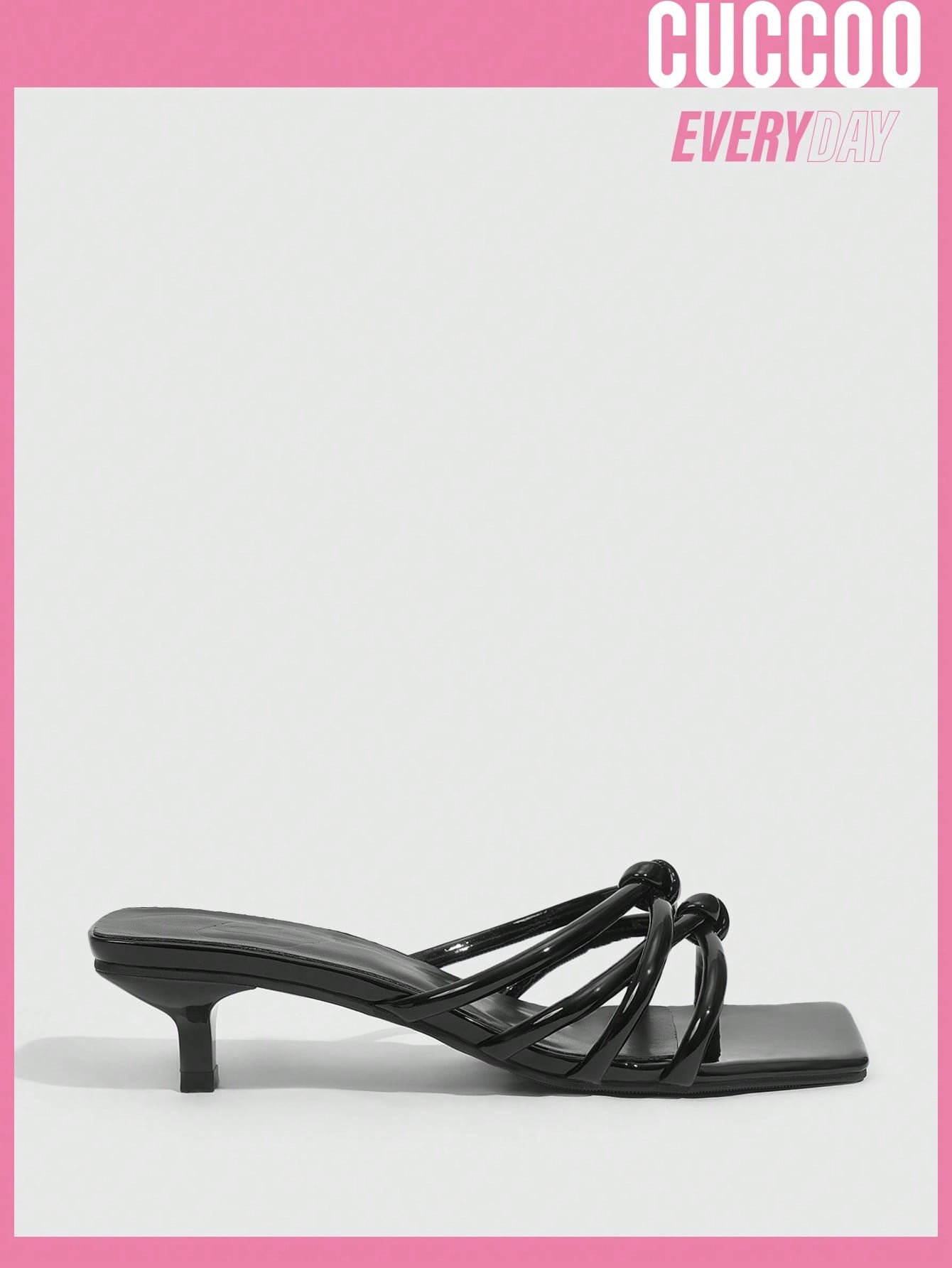 Fashionable high heel black sandals with knot detail and cross strap buckle design for spring and summer.