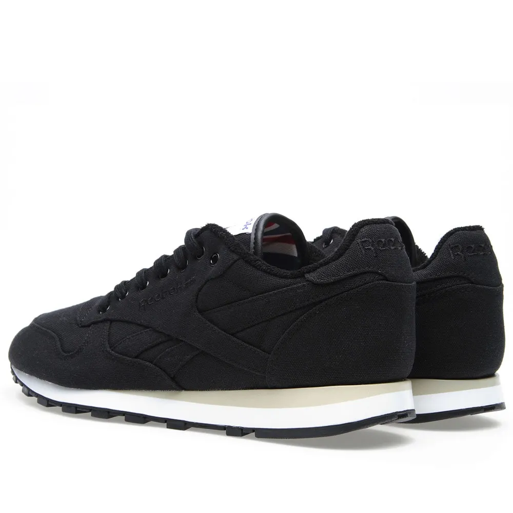 Reebok Classic Lux Textile Black - Stylish and timeless black Reebok sneakers.