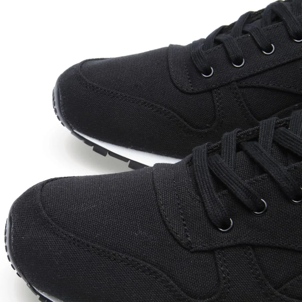 Reebok Classic Lux Textile Black - Stylish and timeless black Reebok sneakers.