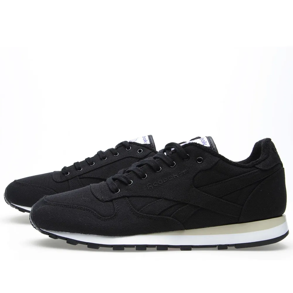 Reebok Classic Lux Textile Black - Stylish and timeless black Reebok sneakers.