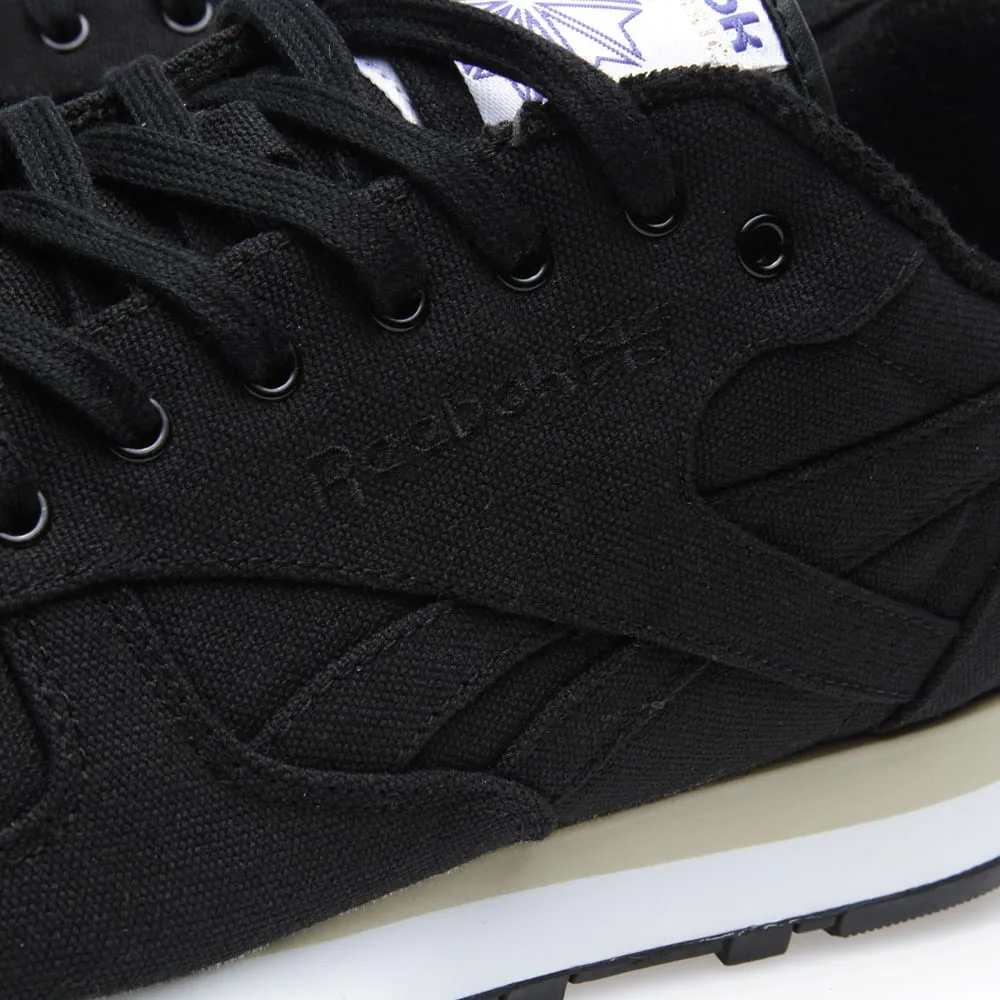 Reebok Classic Lux Textile Black - Stylish and timeless black Reebok sneakers.