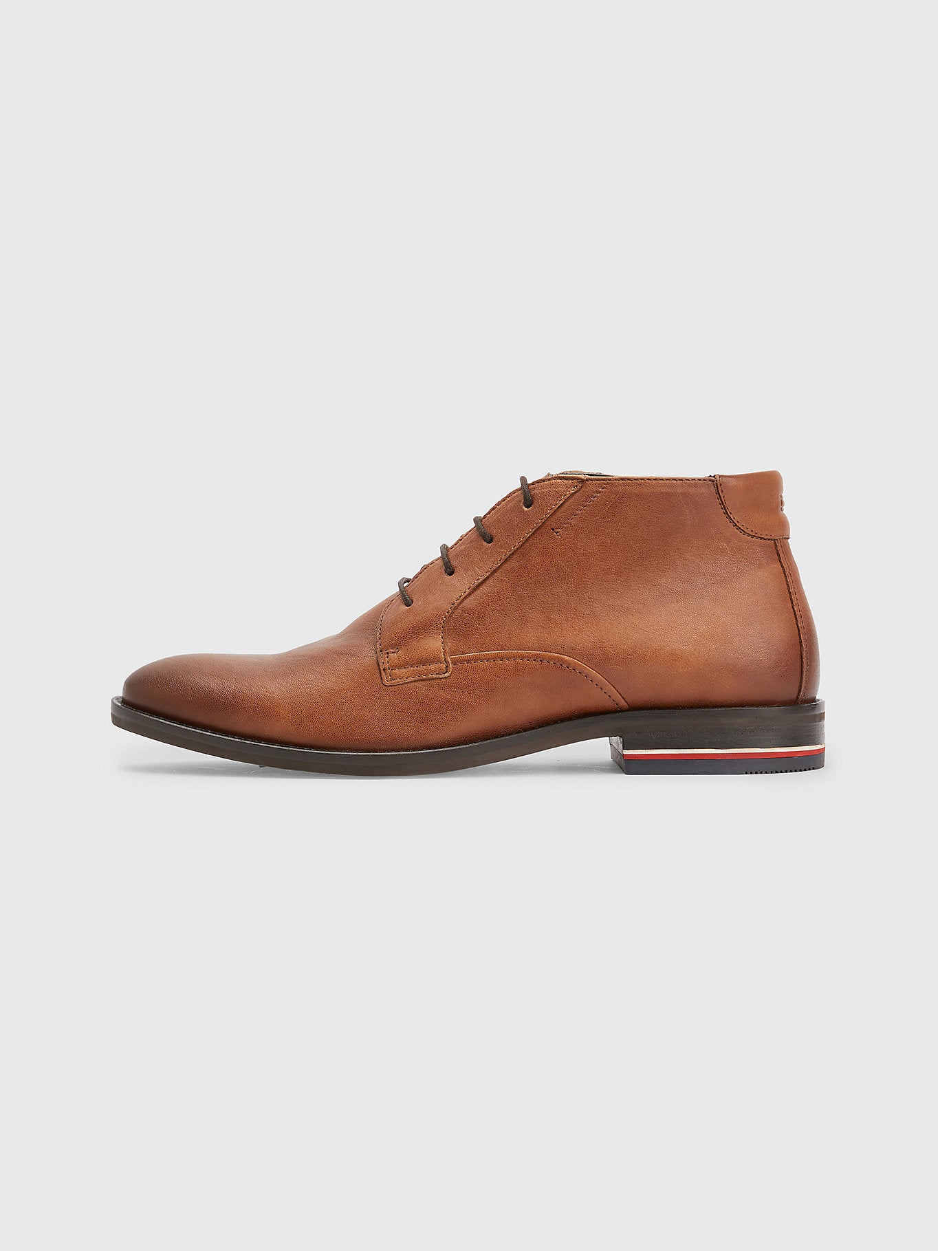 Tommy Hilfiger men's cognac leather ankle boot.