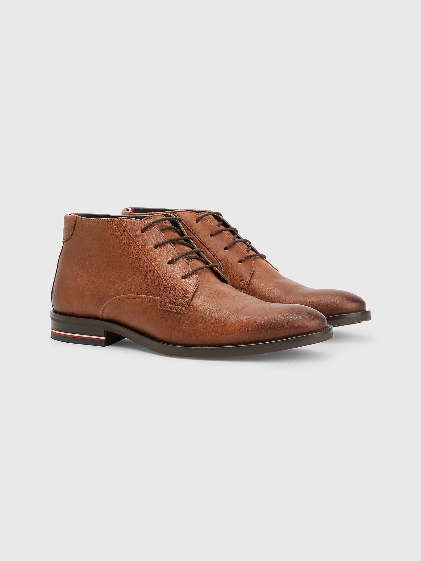 Tommy Hilfiger men's cognac leather ankle boot.