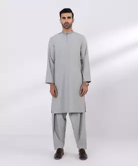 Wash and wear suit with embroidered design.